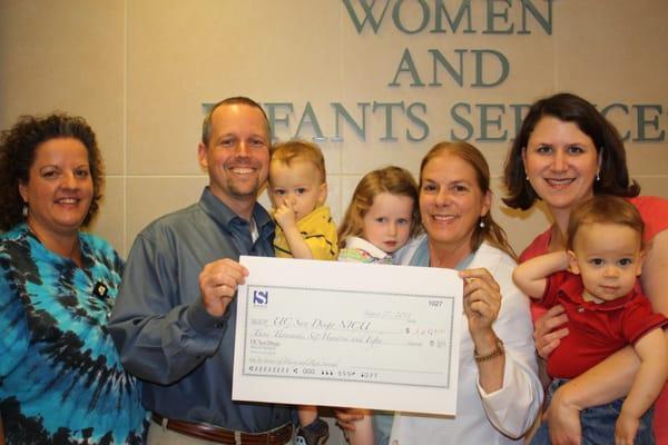 Presenting a check to UCSD's Neonatal Intensive Care Unit (NICU).