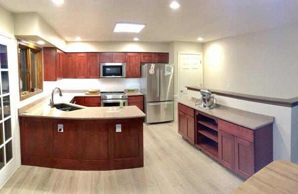 Pano photo, 95% percent completion, before the backsplash and cabinet pulls, but you get the idea.