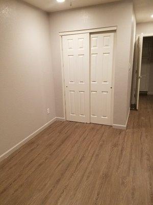 Built closet with new flooring and paint