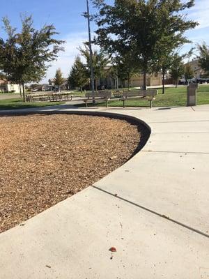 Few picnic tables next to the playground