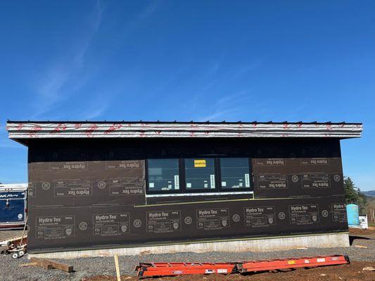 Standing seam metal roof and metal siding on wine storage building in Dundee, OR.