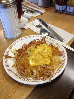 Hashbrowns with cheese,ham, and onions