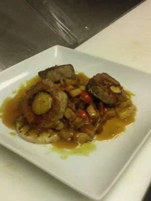 Banana stuffed Pork Tenderloin over a Plantain and Malanga Hash with an Orange Teriyaki Bourbon glaze