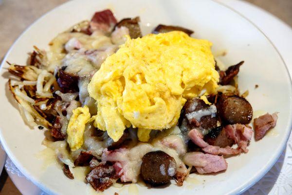 Meat lovers skillet, scrambled eggs