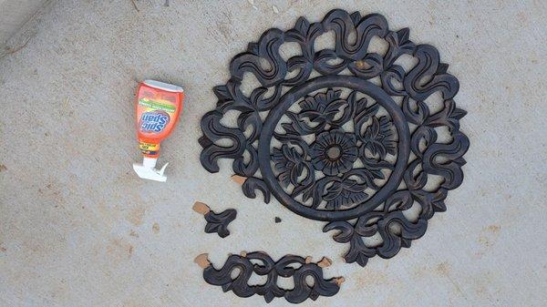 Favored wood mandala broken and unrepaired and unreimbursed.