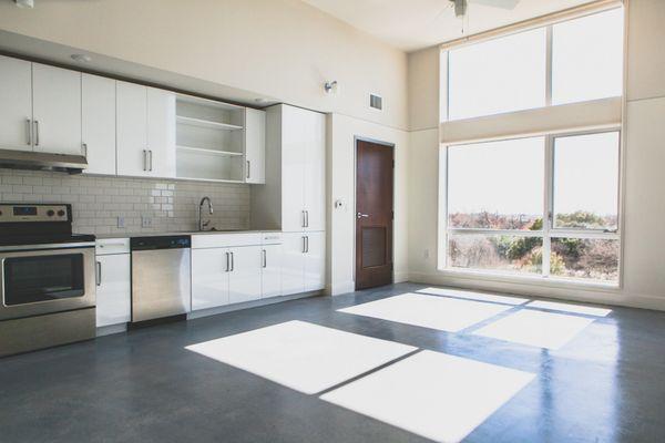 Floor to ceiling windows enhance the minimal design of this Alamo Heights Apartment available now.