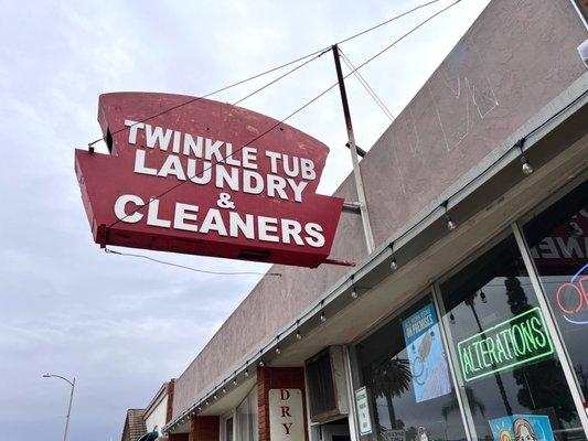 The vintage sign outside of Twinkle Tub. You may not have to see it though because they pick up and deliver!