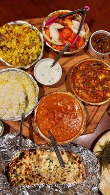 Chicken Tikka, Paneer Tikka Masala, basmati rice, Aloo Gobi, Natraj Kulcha Bread, Navratan Vindaloo