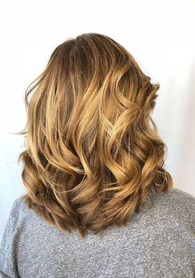 Beach waves are the hottest current style, pair them with some amazing layers and you have the best hairstyle.