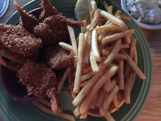 Coconut shrimp and fries and coleslaw