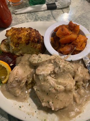 Turkey dinner w/ twice baked potato and cinnamon glazed carrots