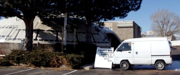 Look for the funny little van by the funky flying saucer!!