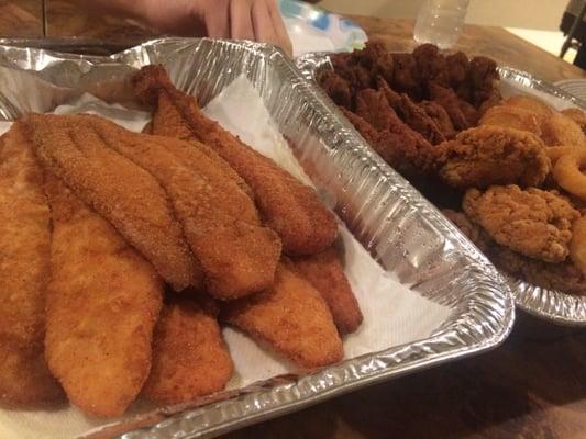 Flounder Filets - breaded and fried to golden beauty.  Add a little tartar sauce and hot sauce, and get ready...