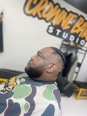 High skin fade with beard faded in