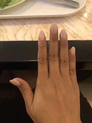 The pinky nail look longer than the other. The color already got ripped!