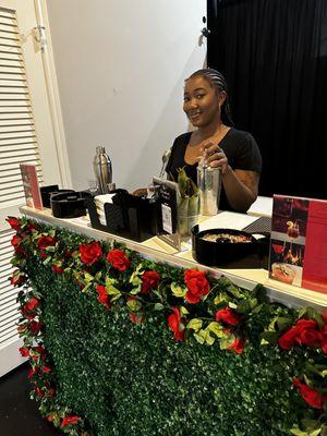 Michel'le, founder & CEO behind the Bar