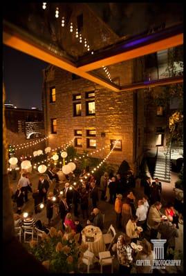 Our Courtyard looks like an Italian street cafe after dark...so pretty!