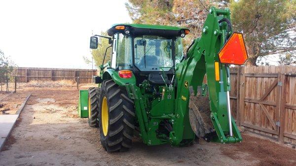 Deere 595 backhoe