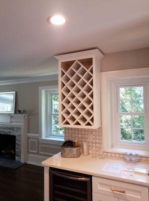 Custom wine rack built into existing cabinetry