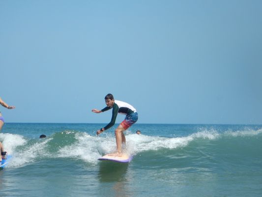 Bold Earth student learning to surf in Costa Rica