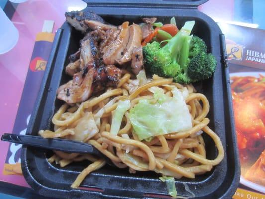 Teriyaki chicken, vegetables (broccoli, carrots, cabbage), lo mein noodles.