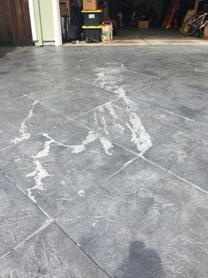 Spilled something on our driveway before sealing. BEWARE