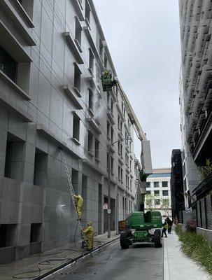 Pressure washing of a commercial building by SF Bay Window Cleaning