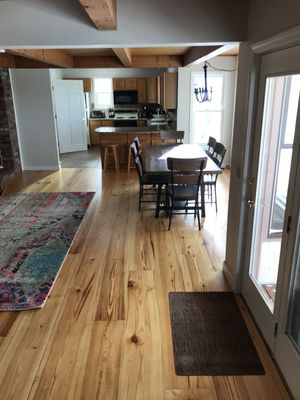 Wood flooring stained and installed.