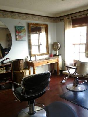 Two cute little hair stations over looking historic lewis street. Specializing in all your hair needs!