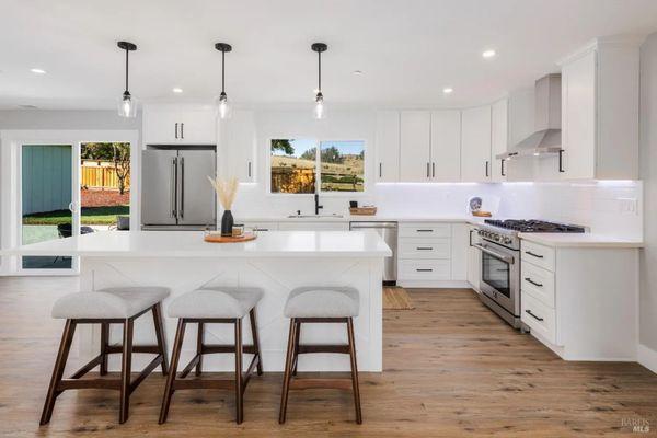 Perfect timeless white shaker kitchen with quartz countertops!