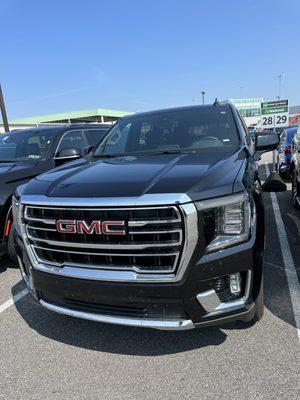 Black rented Yukon.