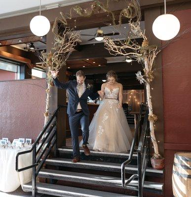 Beautiful manzanita branches decorating the walkway to the bar (and buffet)