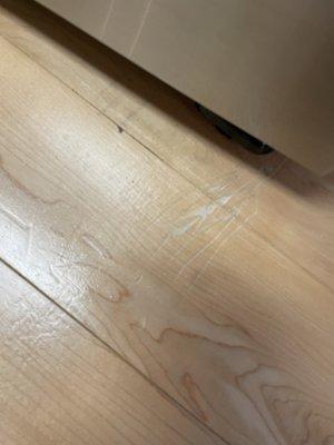 Damage floor with deep scratches