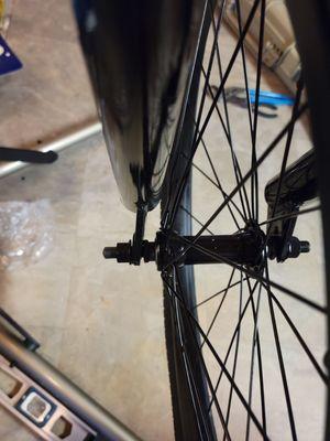 Tab on front fork that is welded off center and crooked.