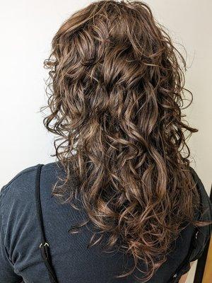 A curly shag haircut