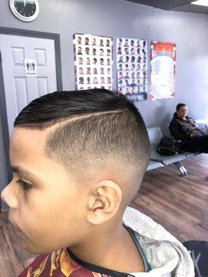 Skin fade comb over