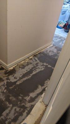 Subfloor repairs before laminate flooring installation.