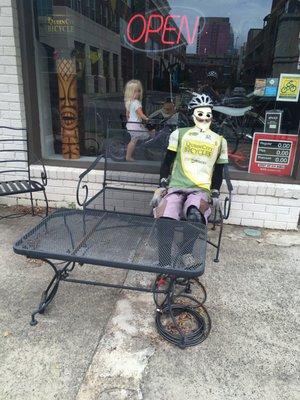 Weird biker dummy helmet head outside that somehow did not catch my eye as I rode right past him as the main location signage.