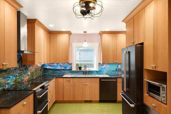 Northend kitchen vintage-modern inspo with white oak flat panel cabinets, a custom hand-painted backsplash and retro marmoleum floor