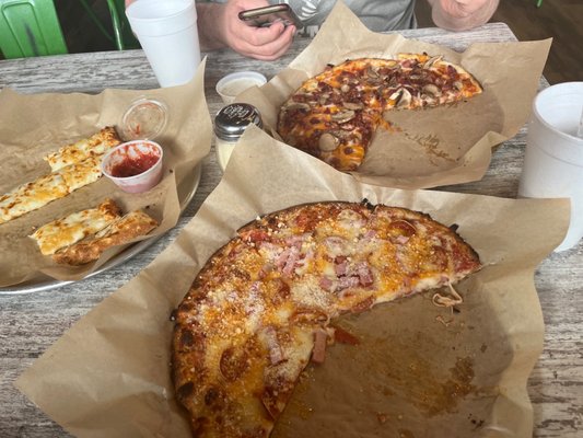 we made our own pizzas! 2 pizzas and cheesey bread!