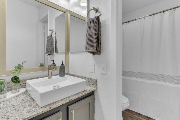 Bathroom with tub shower.