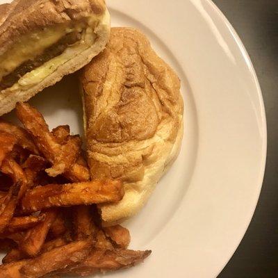 Egg Cheese and Sausage Sandwich with Sweet Potato Fries.