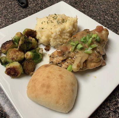 Creamy chicken with sautéed brussel sprouts and mashed potatoes