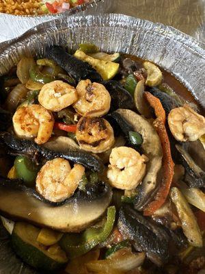 Portabella mushroom fajitas and I added shrimp. Veggies and shrimp were full of flavor!