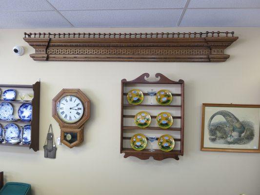 Two fancy oak architectural pieces (one not shown) and other wall decor.