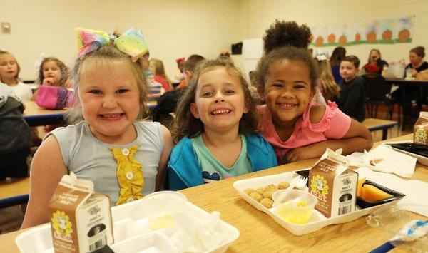 Students Enjoying Friendship and Food at Mayo Elementary School