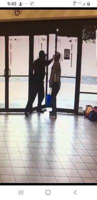 Security guard committing a hate crime.