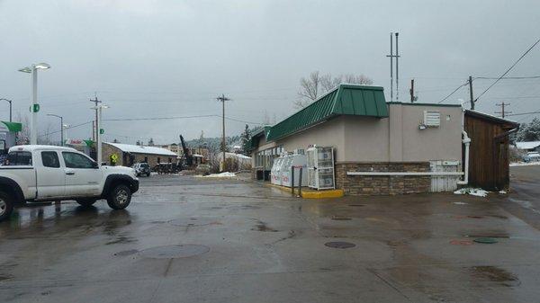 The Kwik Mart is the green gas station in town.