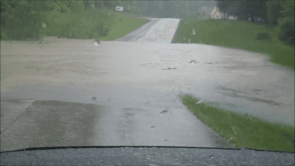 Beginning of a flood - The road is closed