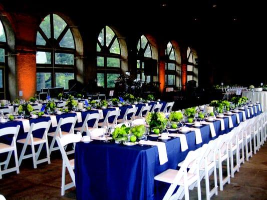 White padded folding chairs and linen